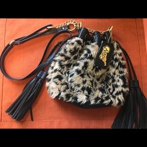 Carlos Santana crossbody purse